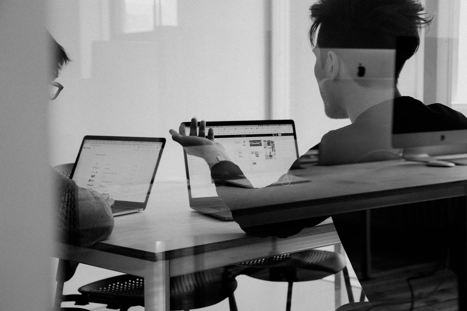 Investors and founders reviewing deployment progress