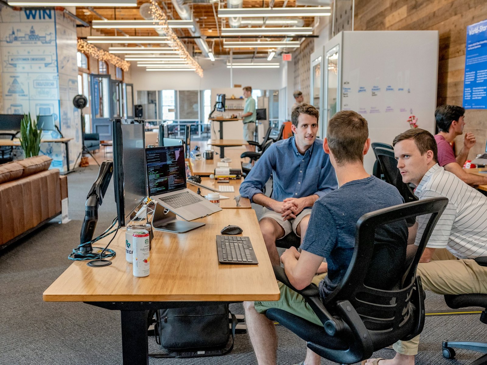 CognioIQ team working together in a bright, modern office